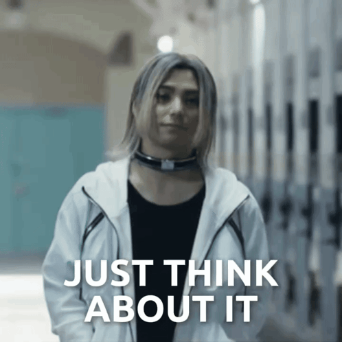 a woman in a white jacket is standing in front of a sign that says " just think about it "