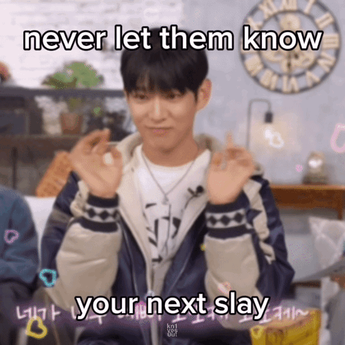 a young man is making a heart with his hands and says " never let them know "