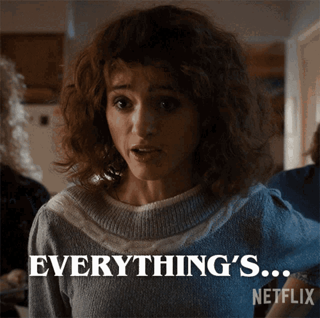 a woman in a sweater says " everything 's " on a netflix poster