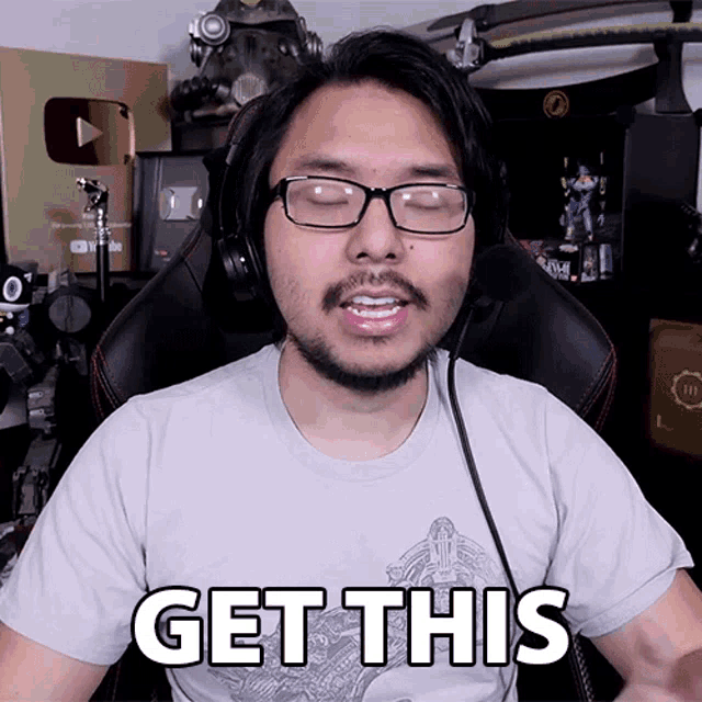 a man wearing glasses and headphones says " get this "