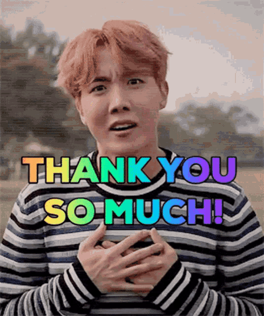 a man in a striped sweater is holding his hands to his chest and says " thank you so much "