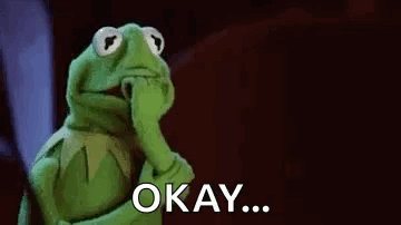 kermit the frog from sesame street is holding his hand to his chin and saying okay .