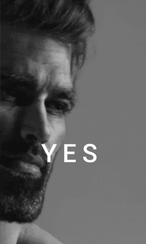 a black and white photo of a man with the word yes written on it