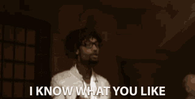 a man talking on a cell phone with the words " i know what you like " below him