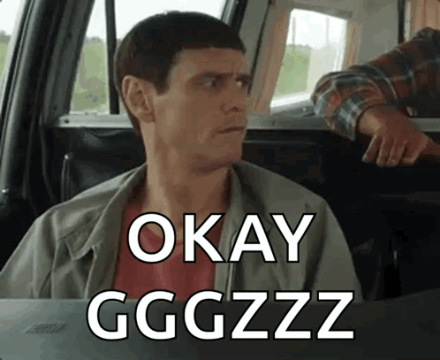 A man in a car looks sideways with the caption “OKAY GGGZZZ.”
