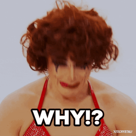 a drag queen with red hair says why !