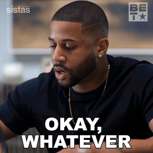 Man at a table says “OKAY, WHATEVER.”