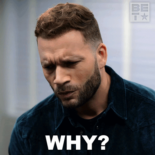 A man looks down in disbelief above a large “WHY?” caption.