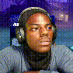 a man wearing headphones and a scarf with the letter r on the bottom
