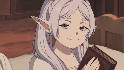 Fern from Frieren smiles gently while holding a book.