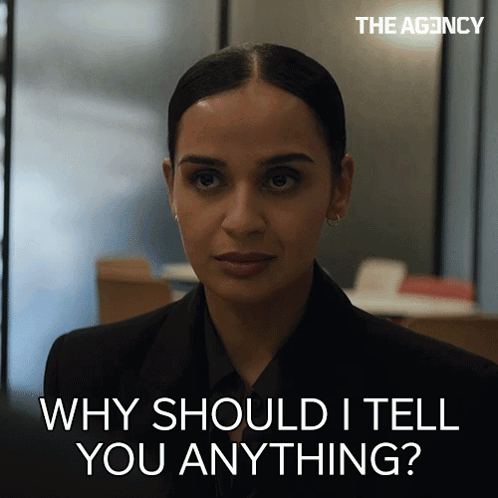 a woman in a suit says why should i tell you anything ..