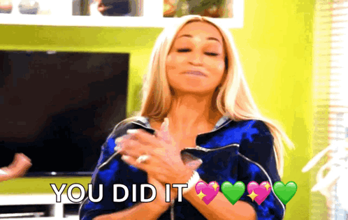 a woman is clapping her hands with the words you did it written on the bottom