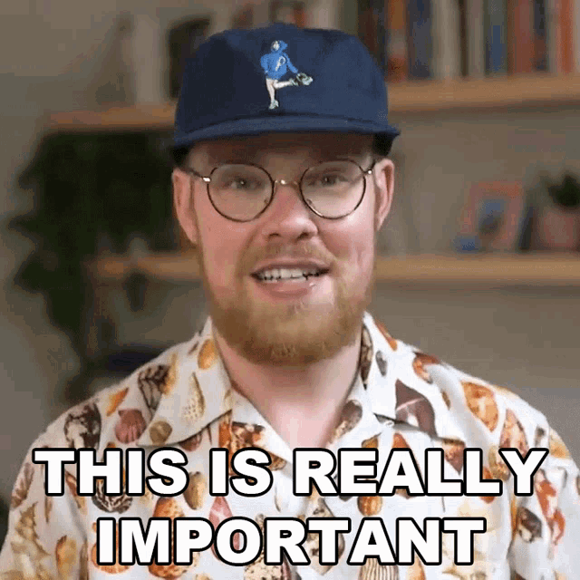 a man wearing glasses and a blue hat says this is really important