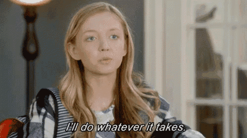 a young girl is saying `` i 'll do whatever it takes '' while sitting in front of a lamp .
