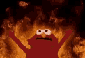 Elmo raises both arms while surrounded by flames.