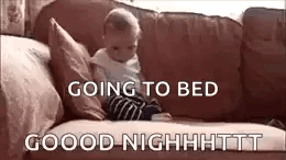 A baby on a couch is captioned GOING TO BED GOOOOD NIGHHHTTT.