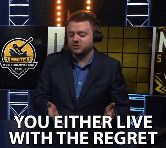 a man wearing headphones and a suit says you either live with the regret