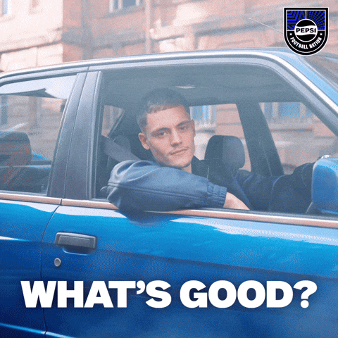 a man is sitting in a blue car with the words what 's good on the bottom