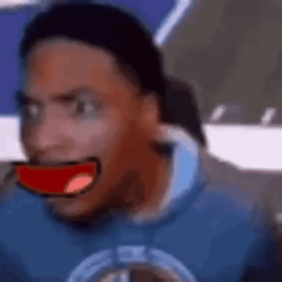 A man leans forward with an exaggerated open-mouthed shocked expression.