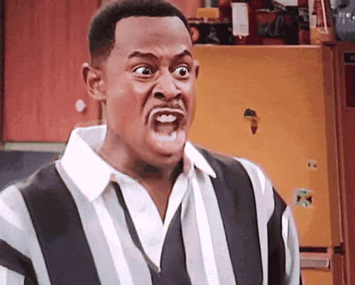 a man making a funny face with his mouth open