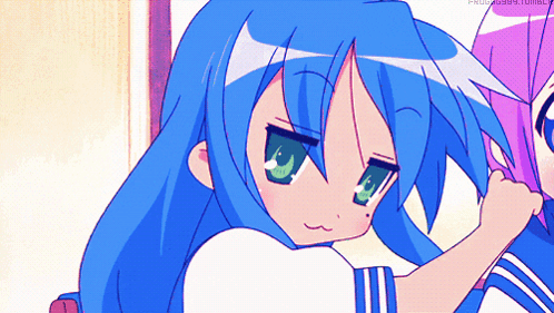 Konata Izumi from Lucky Star gives a small thumbs up.