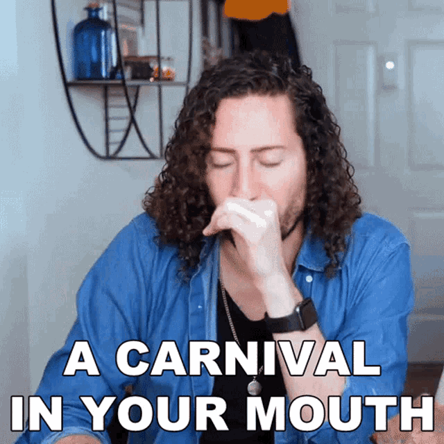 a man with curly hair is covering his nose with his hand and the words " a carnival in your mouth " are above him
