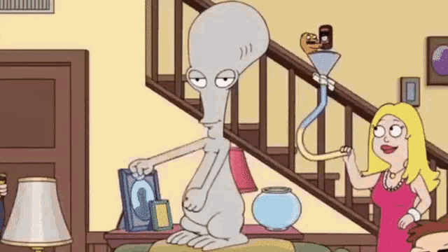 a cartoon character is sitting on a couch in a living room next to a staircase .