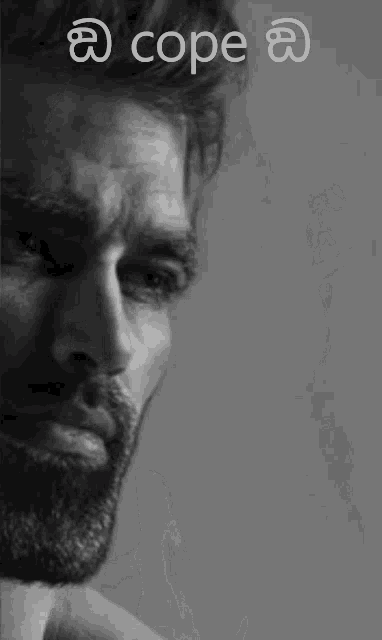 a man with a beard is shown in a black and white photo with a caption that says cope