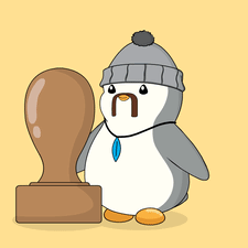 A penguin looks in a mirror while holding a large wooden spoon.