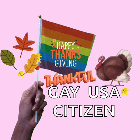 a hand holding a rainbow flag with the words happy thanksgiving thankful gay usa citizen