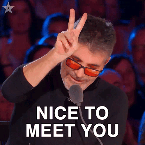 a man giving a peace sign in front of a crowd with the words nice to meet you below him