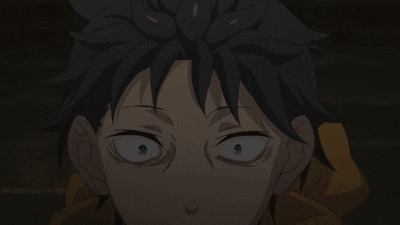 A dark anime close-up shows a boy with an intense unsettled expression.