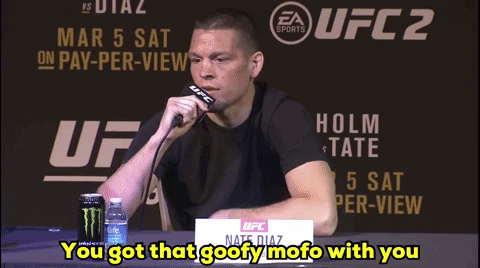 a man talking into a microphone with the words you got that goofy mofo with you