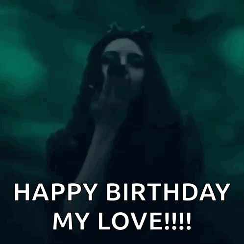 a woman in a cat costume is blowing a kiss and saying happy birthday my love .