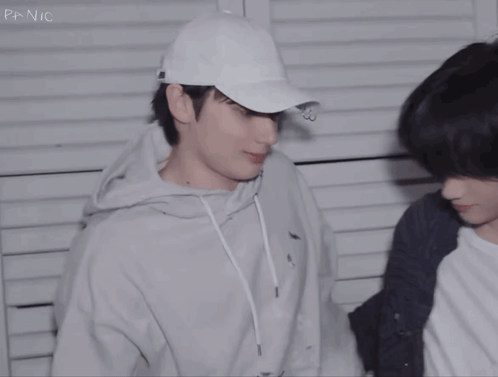 two young men are standing next to each other and the word panic is on the bottom