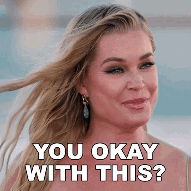a woman is smiling with the words you okay with this