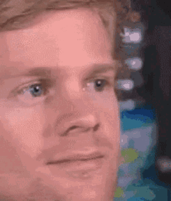 A close-up of a man's face shifts into an incredulous, confused stare.