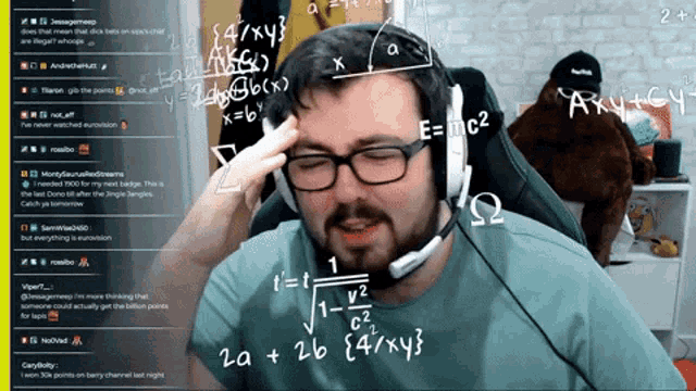 a man wearing glasses and a headset with math equations written on his head