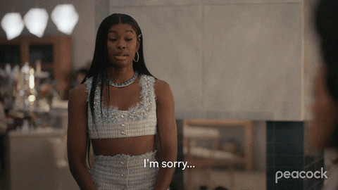 a woman in a crop top says i 'm sorry