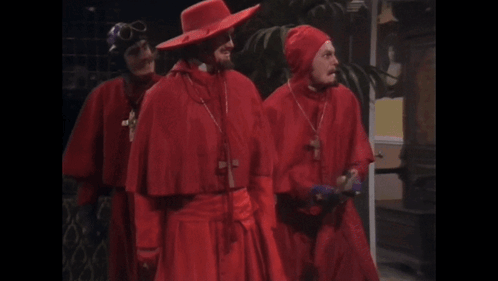 three men in red robes are standing next to each other with the caption our three weapons