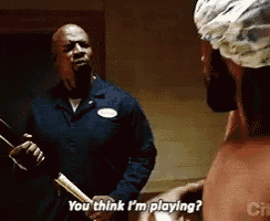 a man with a bandana on his head is talking to another man who says you think i 'm playing ..