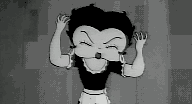 Betty Boop throws her hands up in a frantic rubber-hose cartoon reaction.