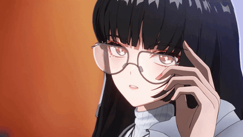 a girl with long black hair and glasses looks at the camera