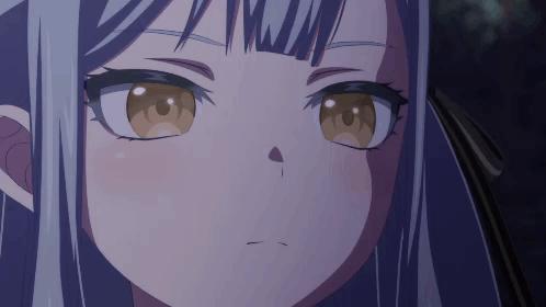 a close up of a girl 's face with a purple hair and brown eyes