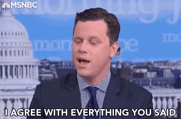 a man in a suit and tie is talking on a television show and says i agree with everything you said .