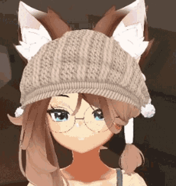 a girl wearing a knitted hat with ears on it .