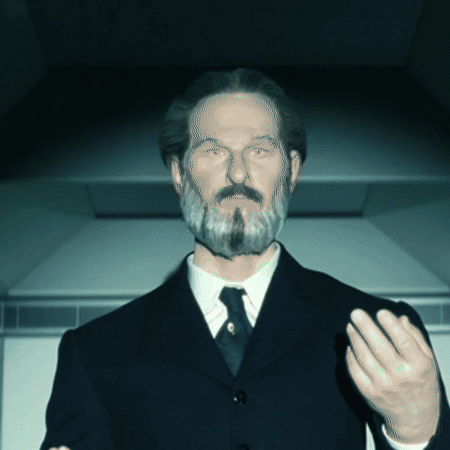 a man with a beard and mustache is wearing a black suit and tie