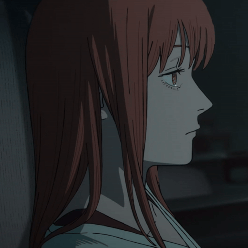 Makima from Chainsaw Man looks ahead in profile with tears in her eyes.