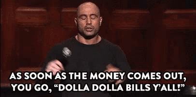 a bald man is holding a microphone and saying `` as soon as the money comes out , you go ``