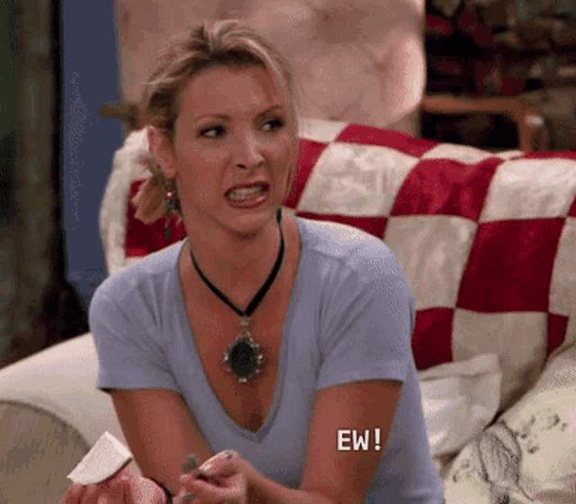 Phoebe Buffay looks uncomfortable with a small “EW!” caption.